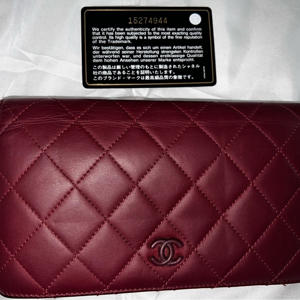 2011-2012 Chanel Long Flap Wallet, Lambskin Burgundy. Has signs of wear!!!